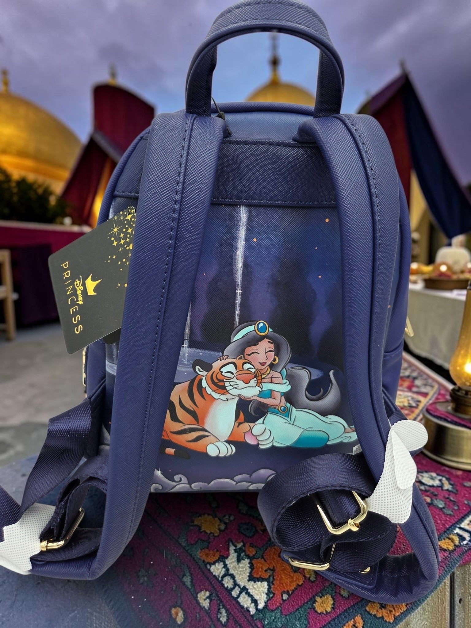 Momof2boyz Shop Disney Aladdin mini backpack featuring a back print of Princess Jasmine and Rajah on navy faux leather
