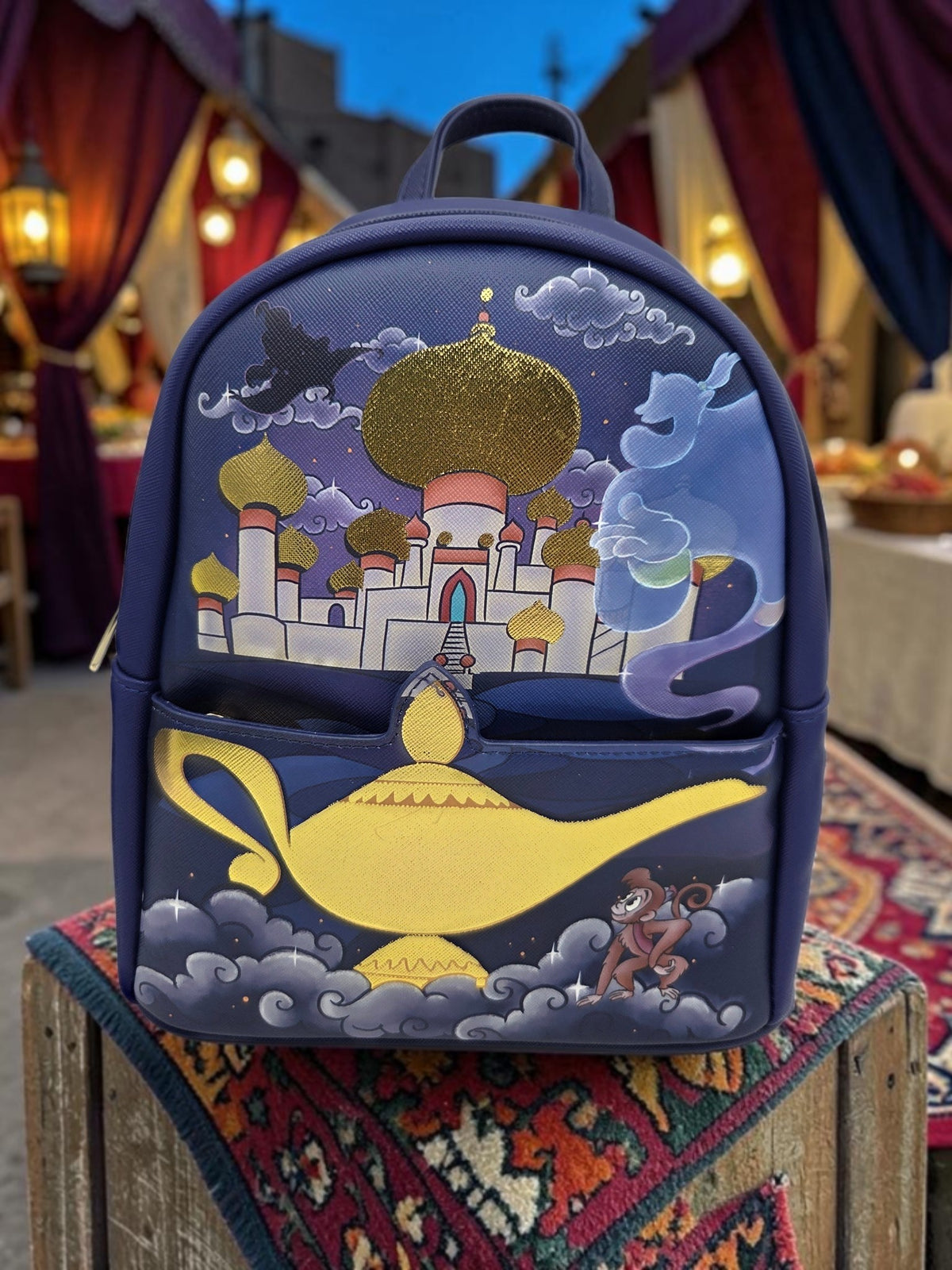 Momof2boyz Shop Disney Aladdin Loungefly mini backpack in navy faux leather with palace, Genie, and magic lamp design.