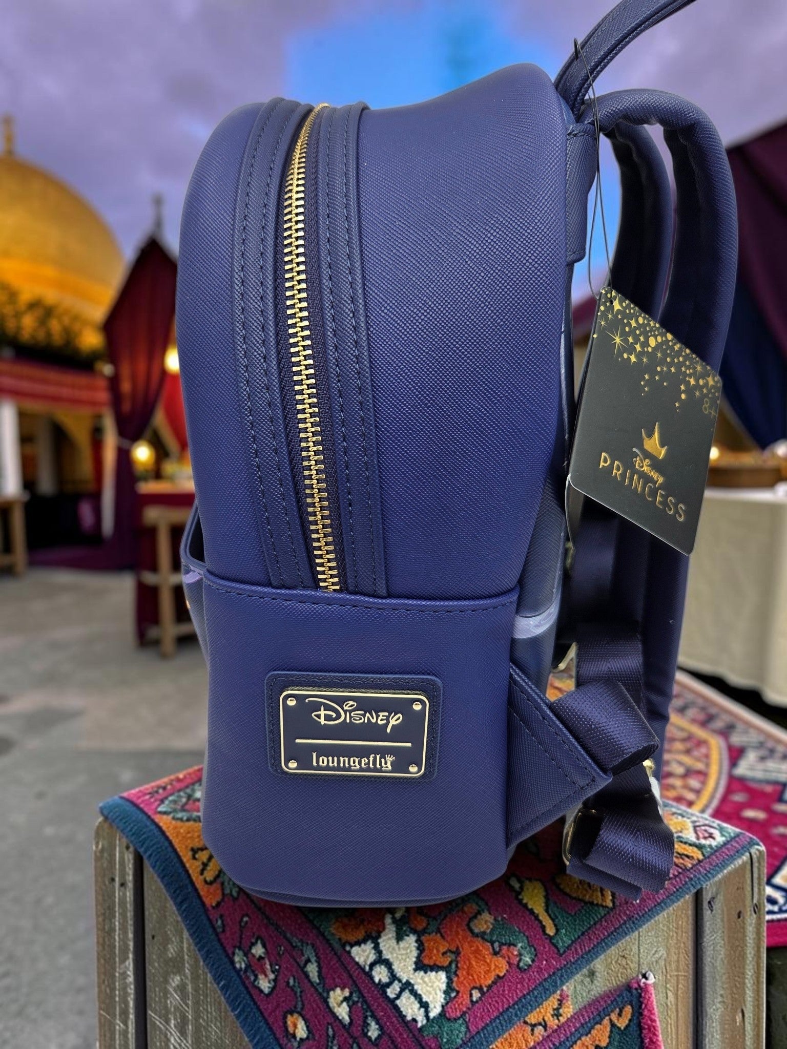 Momof2boyz Shop Disney Loungefly Aladdin mini backpack in navy blue faux leather with gold zipper and metal plaque