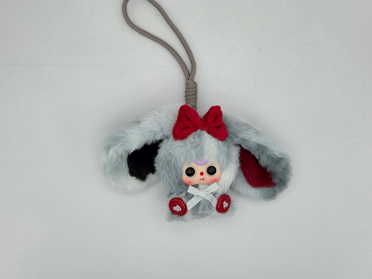 Momof2boyz Shop Baby Three Alice Rabbit Town plush keychain with grey fur, red bow, and heart-detailed feet.