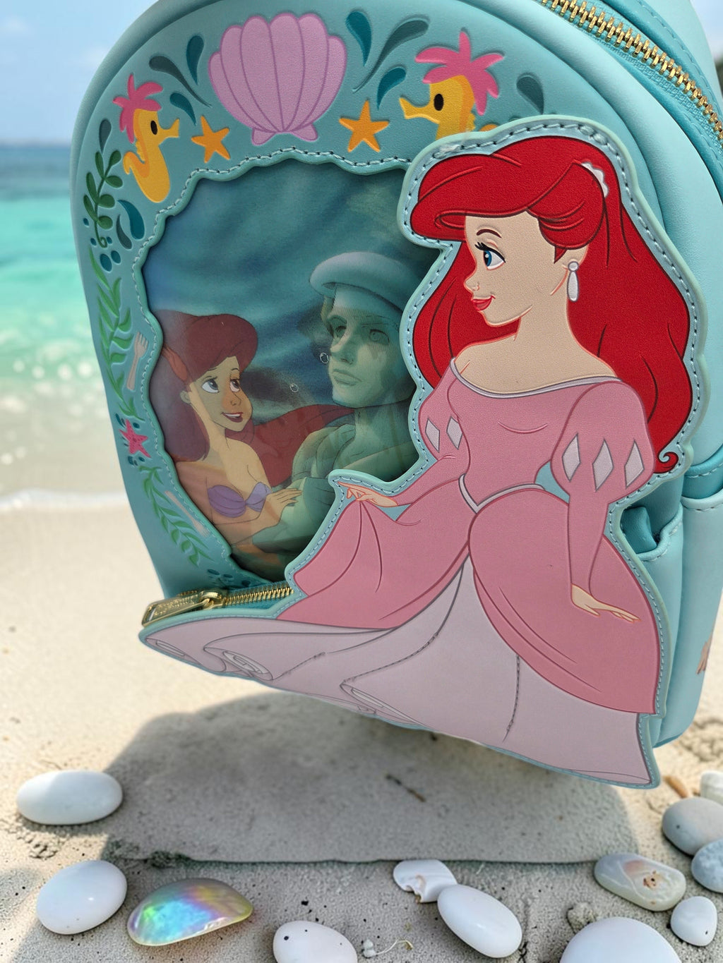 Momof2boyz Shop Disney Loungefly Little Mermaid mini backpack in light blue vegan leather with Ariel applique on beach