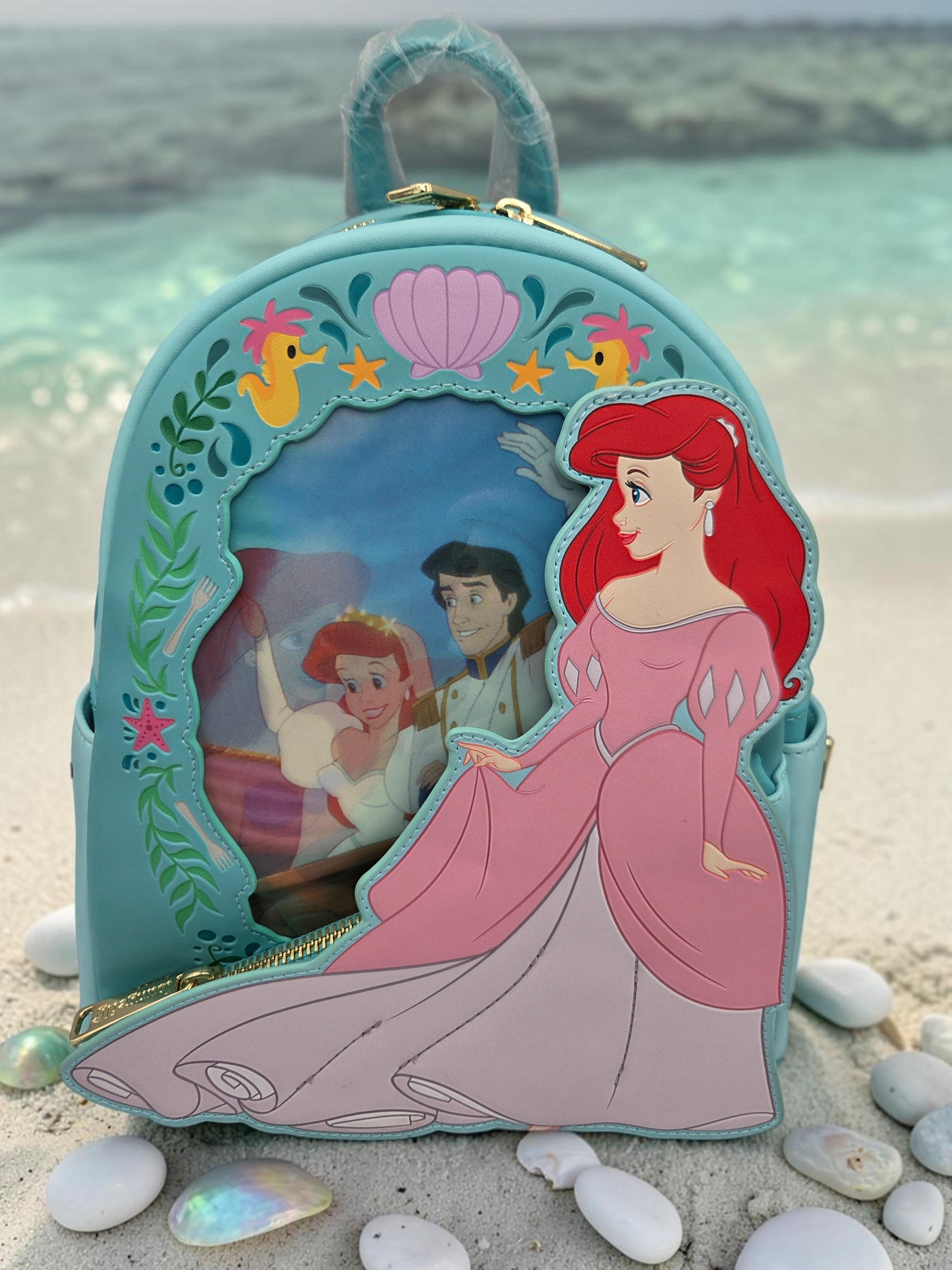 Momof2boyz Shop Disney Loungefly Little Mermaid Ariel mini backpack in light blue vegan leather with gold hardware.