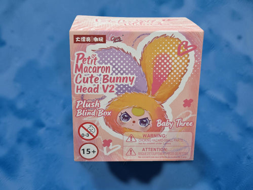 Momof2boyz Shop Baby Three Petit Macaron Cute Bunny Head V2 plush blind box collectible in Vanilla Dream colorway.