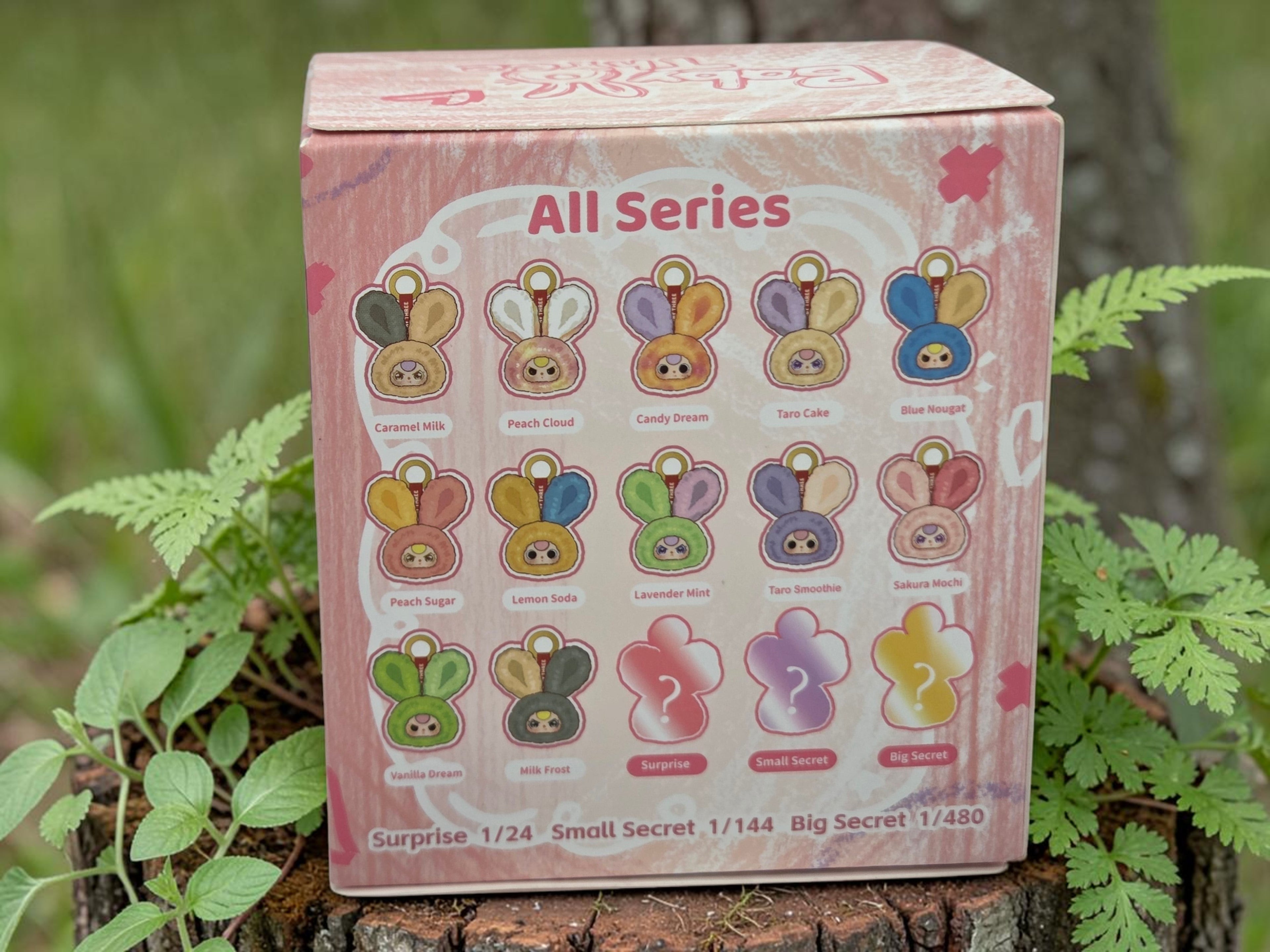 Momof2boyz Shop Baby Three Petit Macaron blind box featuring cute bunny head designs in various pastel colors. Collectible toy.