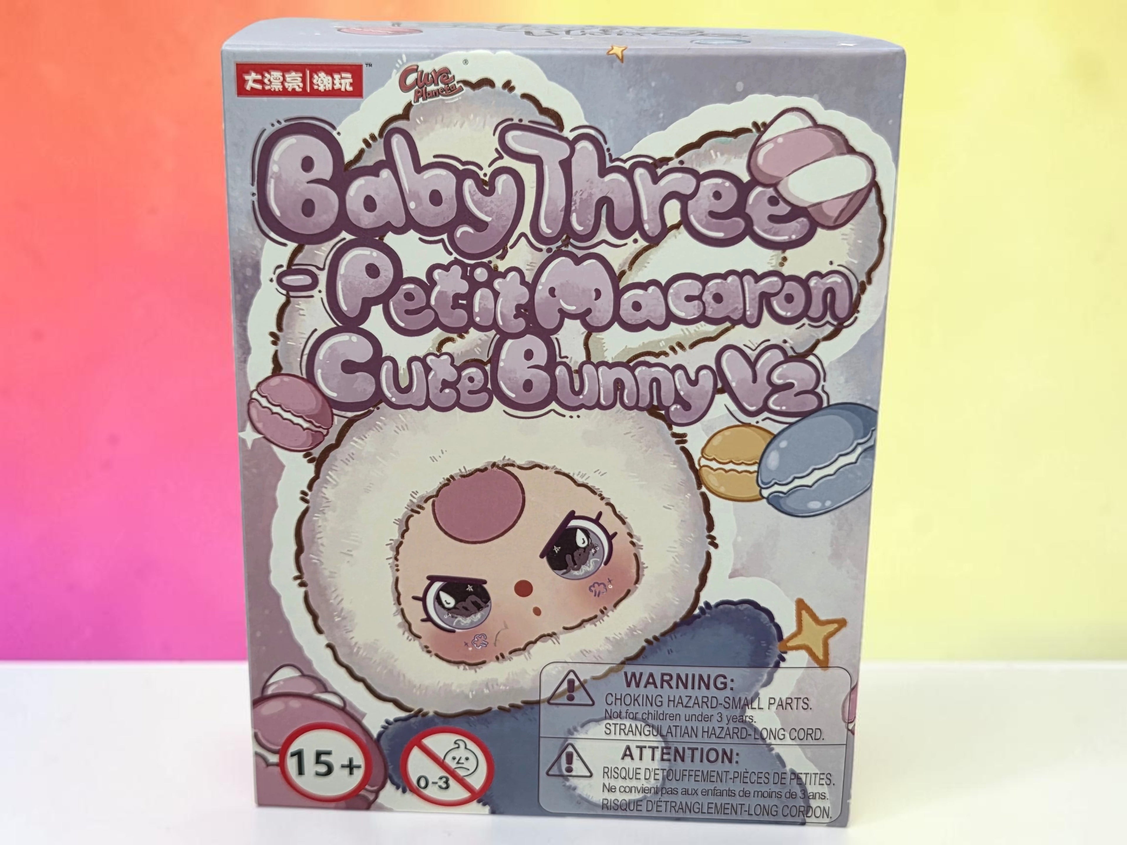 Momof2boyz Shop Baby Three Petit Macaron Cute Bunny V2 blind box packaging with whimsical purple aesthetic design.