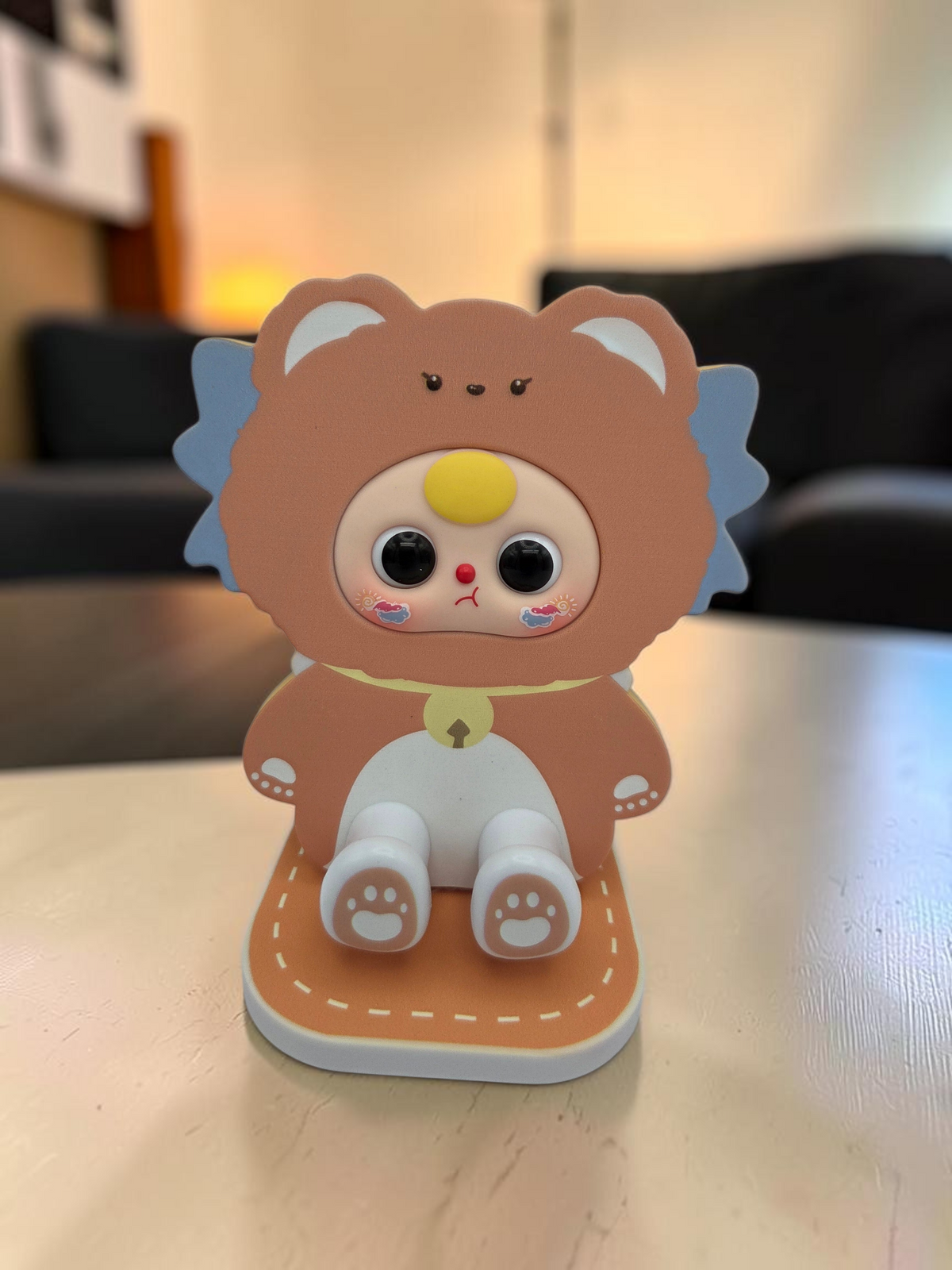 Momof2boyz Shop Baby Three BB3 TV stand featuring a cute brown bear character design on a stable display base.
