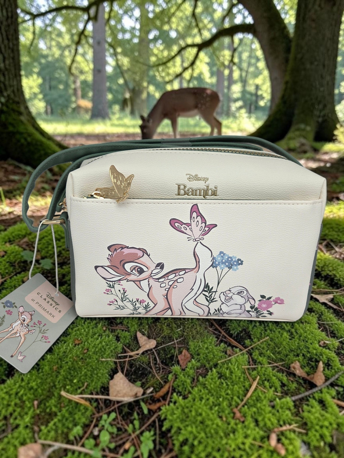 Momof2boyz Shop Disney Bambi crossbody bag in cream and sage green with Thumper and butterfly zipper pull in a forest