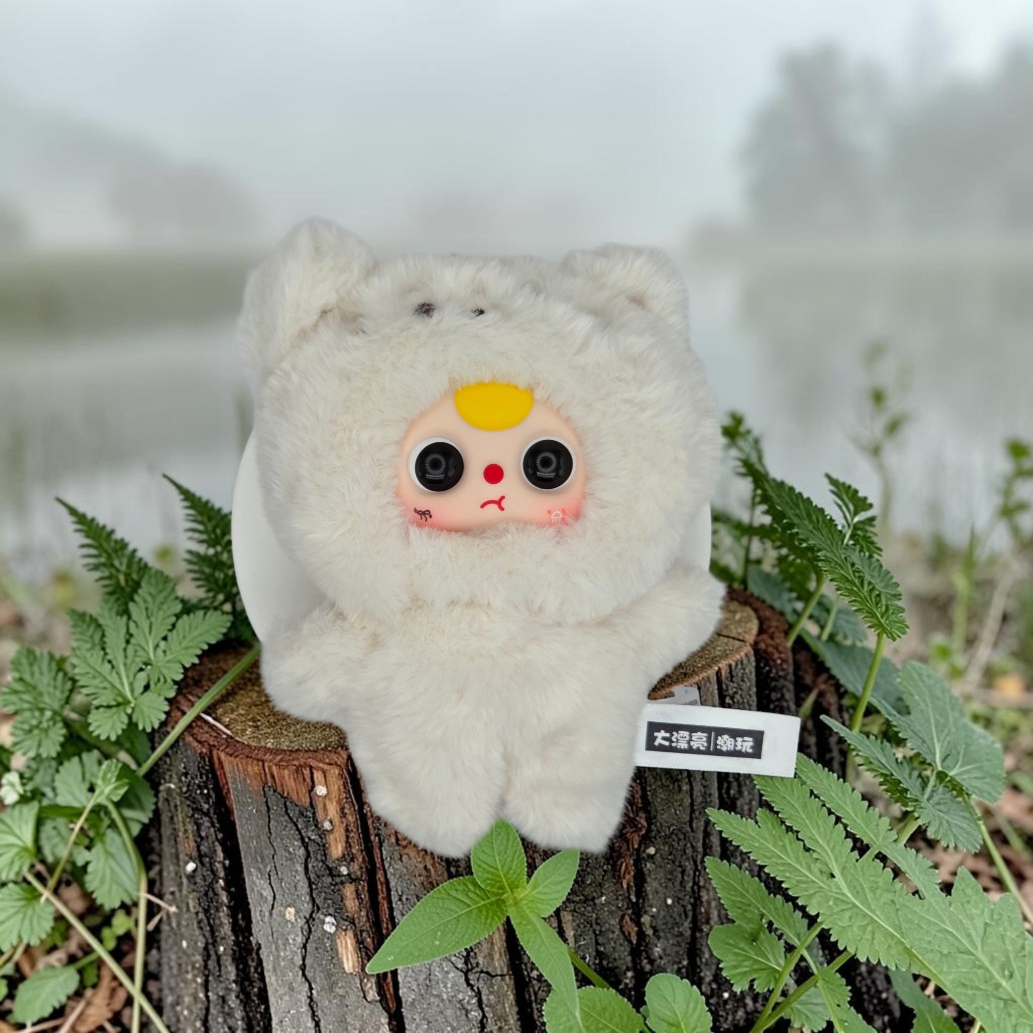 Momof2boyz Shop BB3 Petit Cat Wardrobe v2 Milo, a fluffy white plush toy with large black eyes and yellow hair.