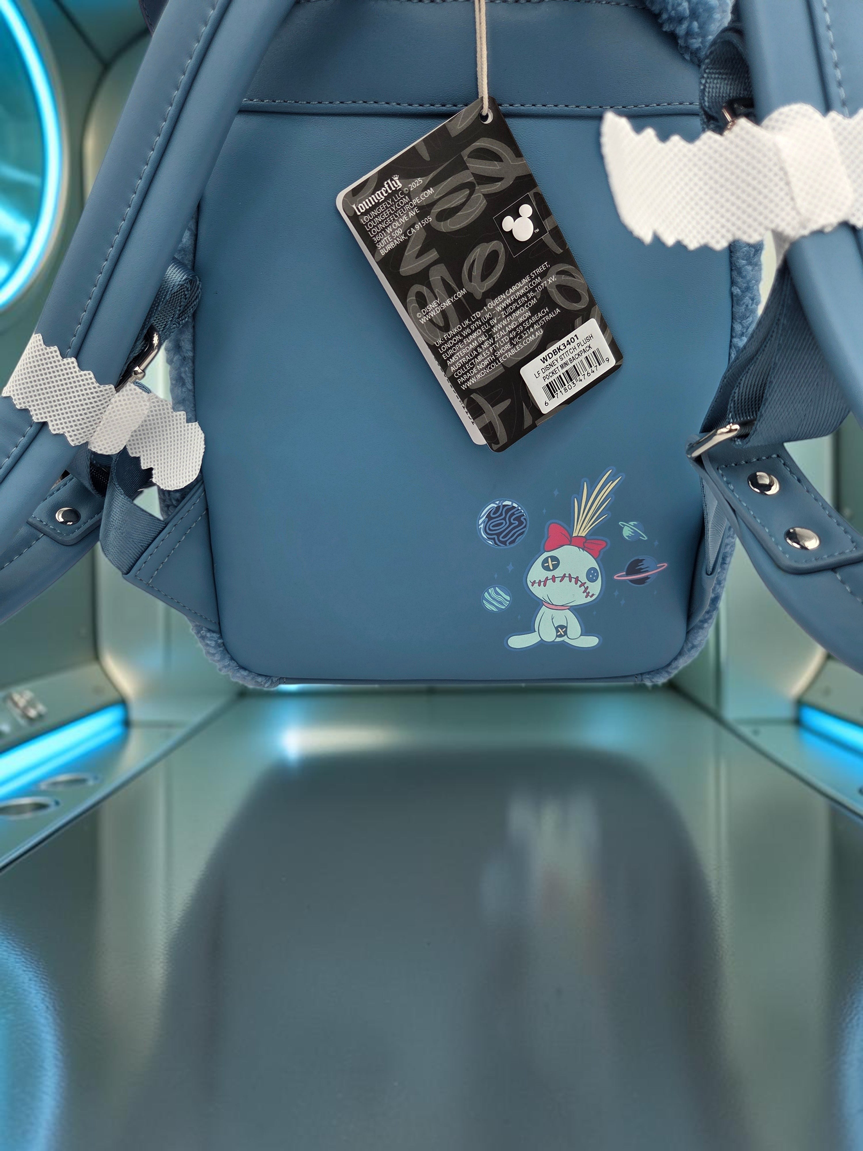 Momof2boyz Shop blue Stitch mini backpack with plush trim and space-themed graphic on the back panel