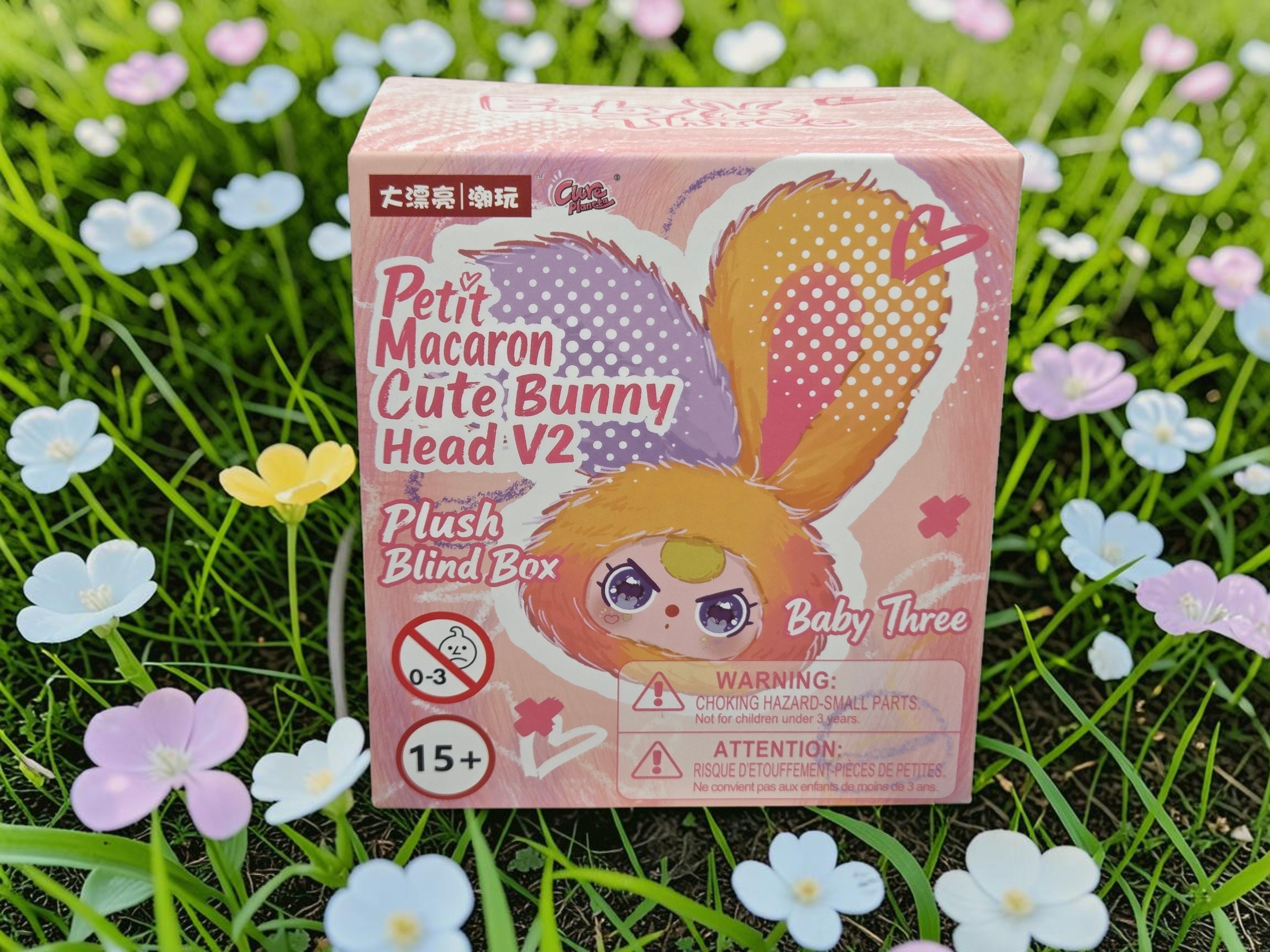 Momof2boyz Shop Baby Three Petit Macaron Cute Bunny Head V2 plush blind box, yellow and purple ears, cute collectible toy.