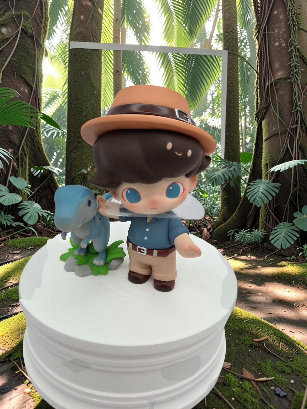 Momof2boyz Shop DIMOO Jurassic World collectible figure wearing a safari hat and shirt with a small blue dinosaur
