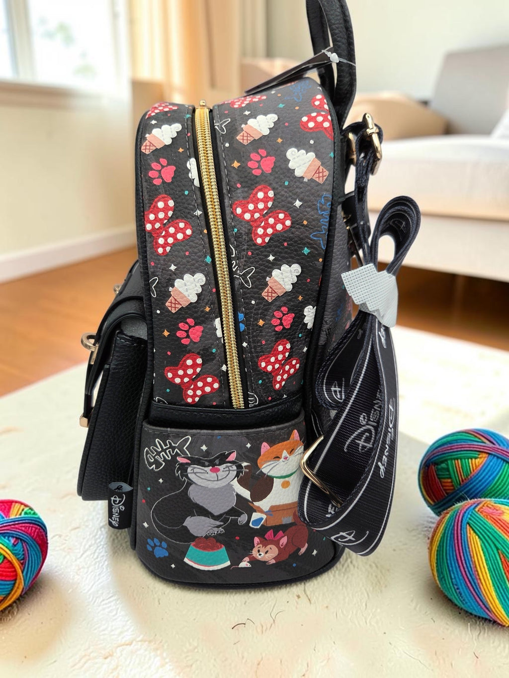 Momof2boyz Shop Disney cat themed mini backpack in black vegan leather with colorful character print and gold hardware