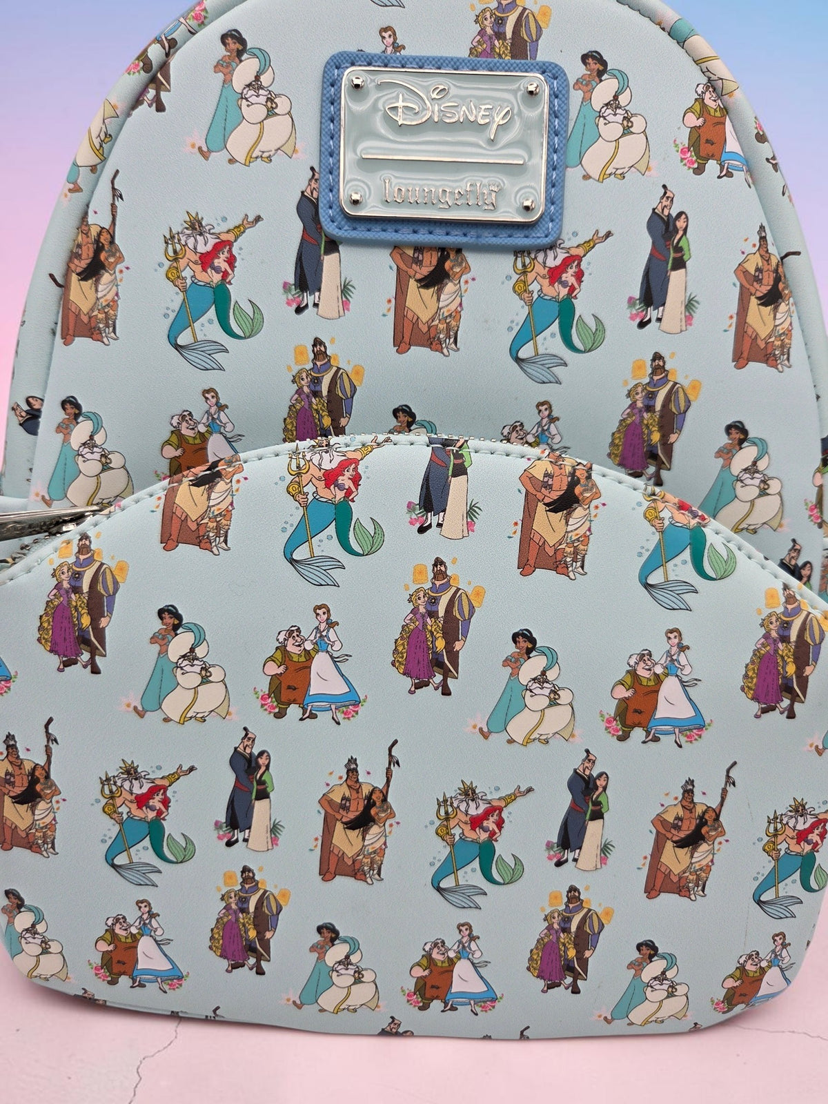 Momof2boyz Shop Disney Loungefly mini backpack in pastel blue vegan leather with an all-over Disney Princesses and Dads print.