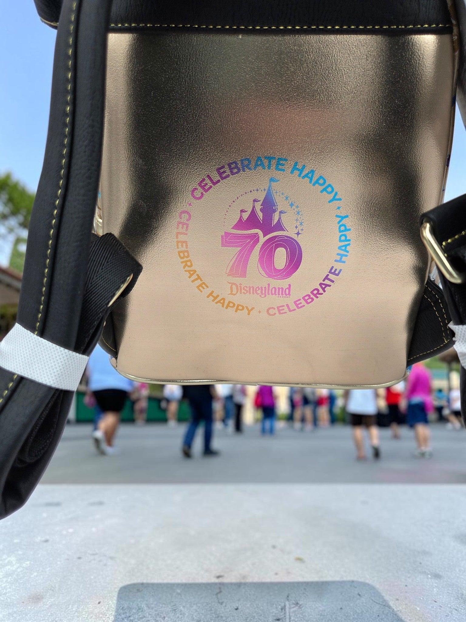 Momof2boyz Shop Disneyland 70th Anniversary mini backpack in metallic gold with commemorative colorful logo