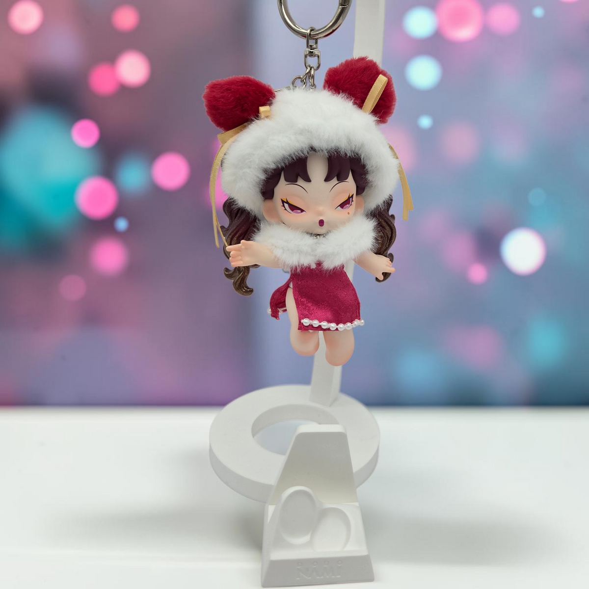 Momof2boyz Shop Dodo Nami Cheers Day collectible keychain figure wearing a red velvet dress and fuzzy white hat