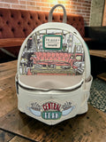 Momof2boyz Shop Friends Central Perk mini backpack in cream and green vegan leather with iconic couch graphic print