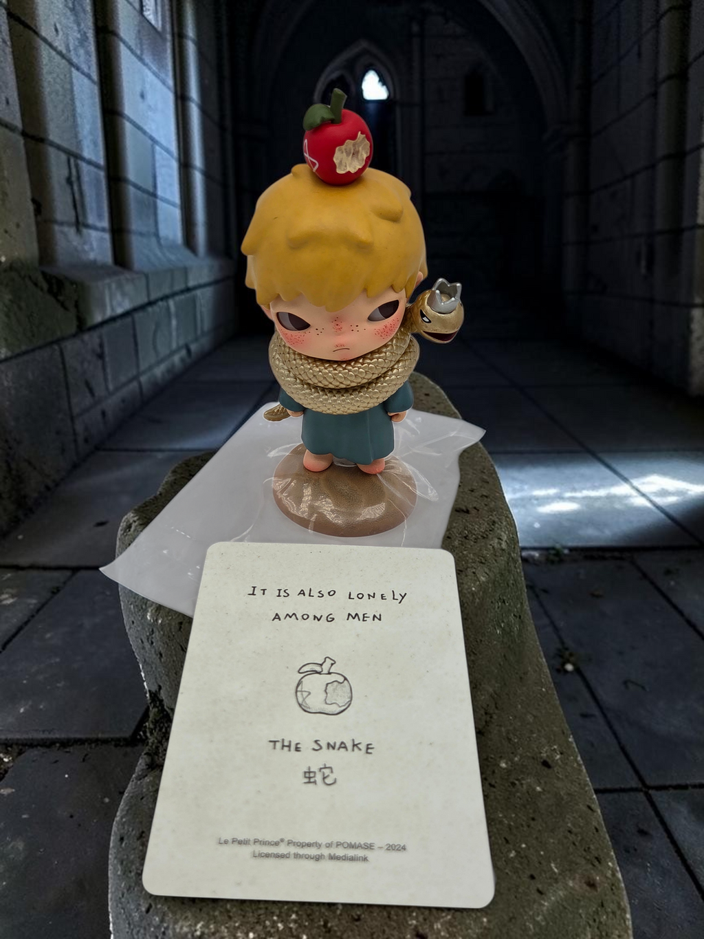 Momof2boyz Shop Hirono Le Petit Prince collectible figure with a snake and apple, displayed with its character card.