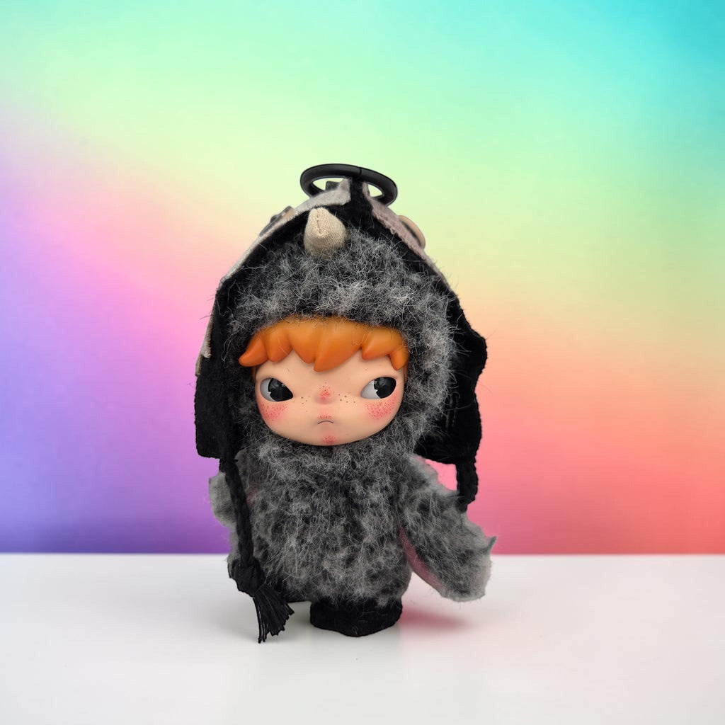 Momof2boyz Shop HIRONO Mist Walker collectible art toy featuring a moody character in a grey faux-fur hooded outfit.