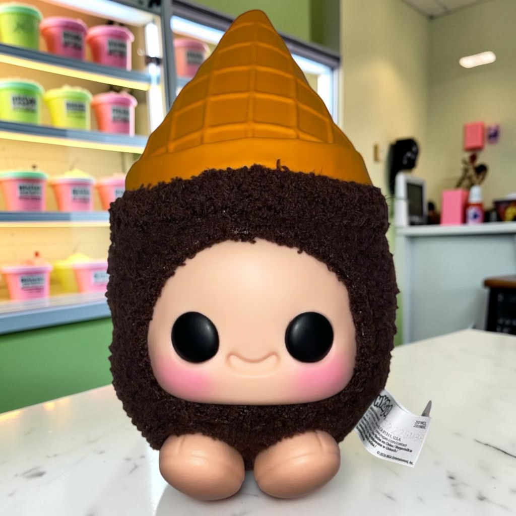 Momof2boyz Shop Hyejo collectible plush toy featuring a brown fuzzy body, vinyl ice cream cone hat, and cute face.