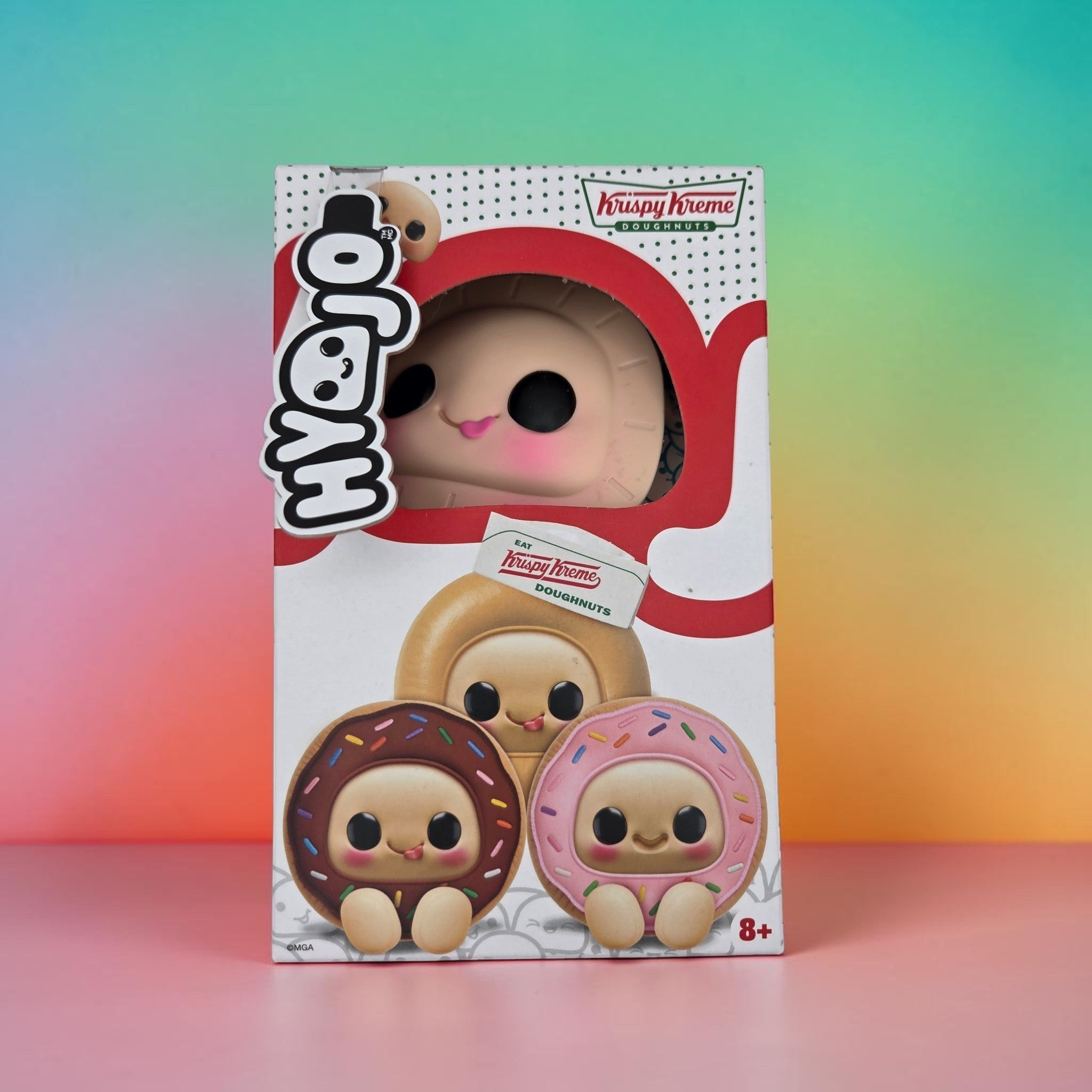 Momof2boyz Shop Krispy Kreme doughnut collectible plush toy in branded window display box with cute character design.