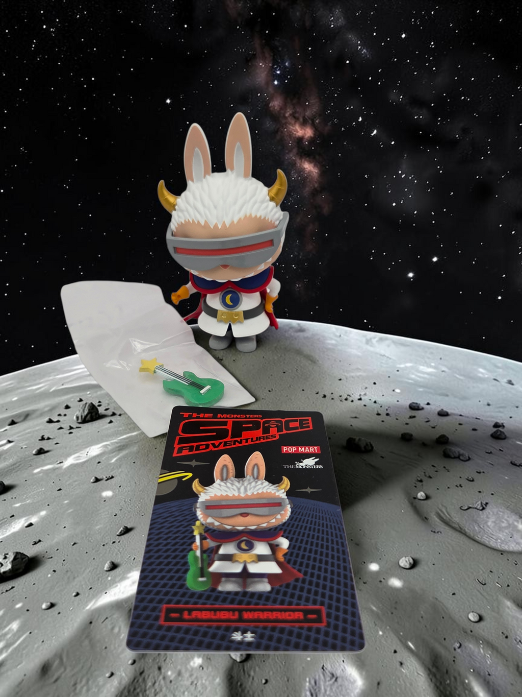 Momof2boyz Shop Labubu Warrior action figure with space visor and guitar accessory on a moon surface background