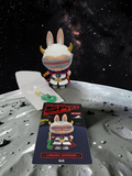 Momof2boyz Shop Labubu Warrior action figure with space visor and guitar accessory on a moon surface background