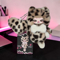 Momof2boyz Shop Monday plush keychain featuring a leopard print faux fur hood, white bow, and collector card.