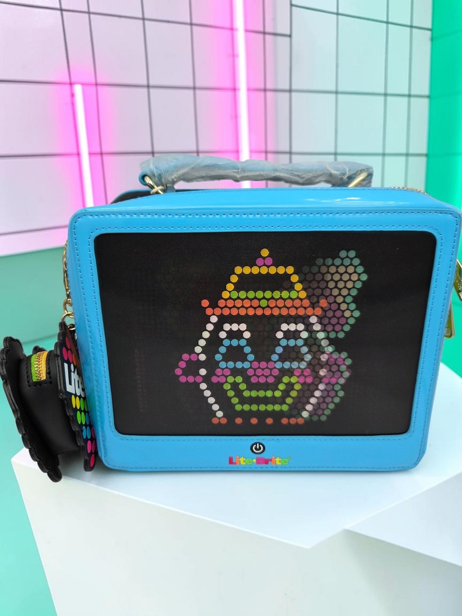 Momof2boyz Shop Loungefly Lite-Brite blue crossbody bag with a retro toy board design and heart-shaped coin purse.