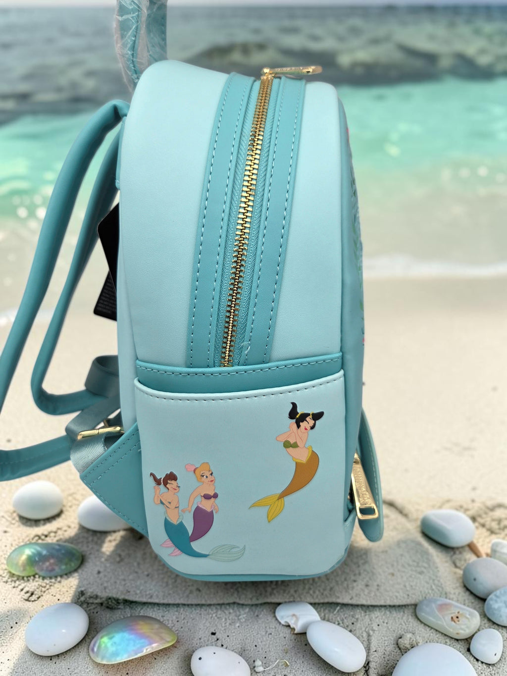 Momof2boyz Shop Disney Loungefly Little Mermaid mini backpack in light blue vegan leather with mermaid sister side art