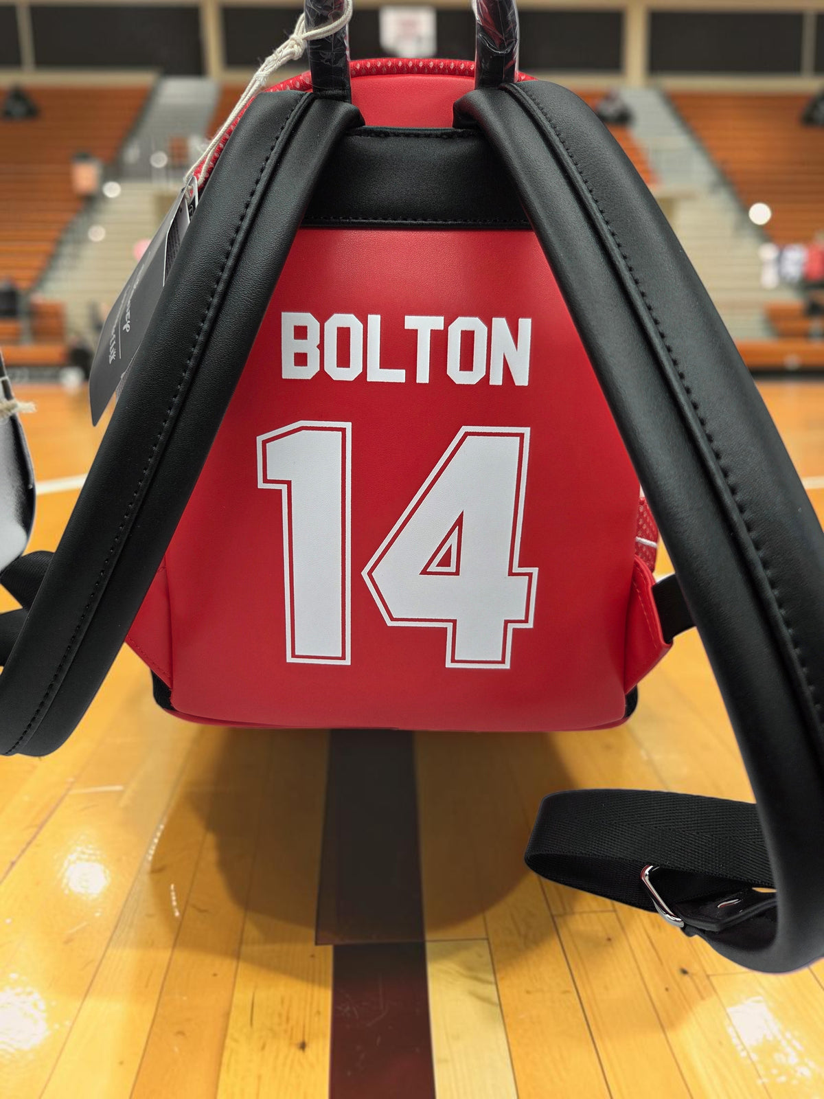 Momof2boyz Shop Loungefly High School Musical mini backpack featuring red jersey back with BOLTON 14 print