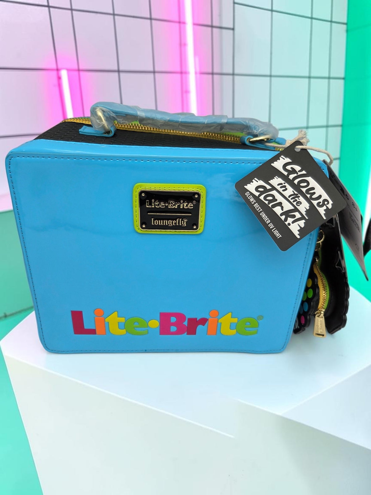 Momof2boyz Shop Loungefly Lite-Brite blue crossbody bag with glow-in-the-dark retro toy design and heart coin purse.