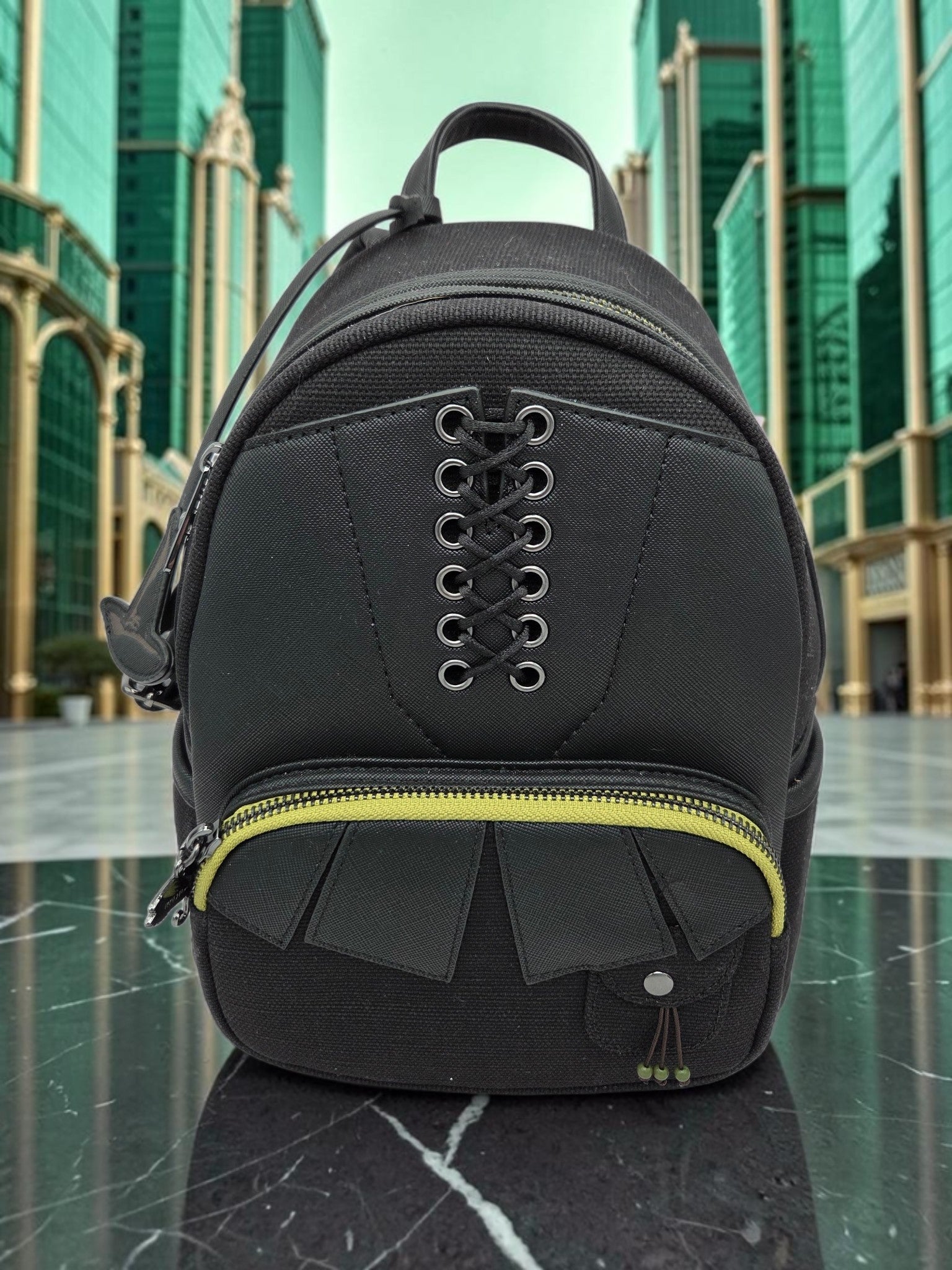 Momof2boyz Shop Loungefly Wizard of Oz Wicked Witch mini backpack in black canvas with lace-up front and lime zipper