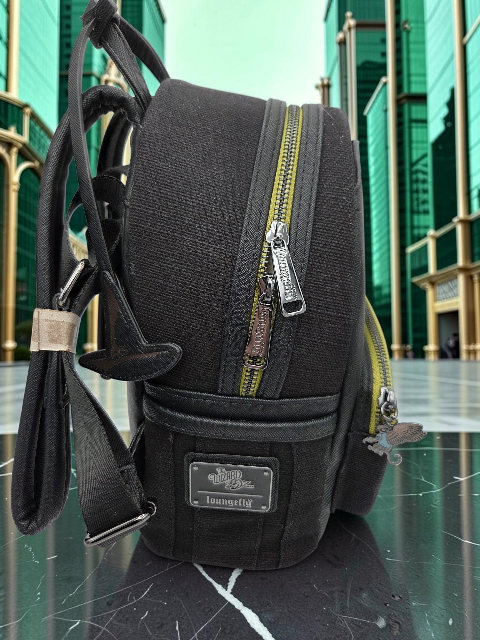 Momof2boyz Shop Loungefly Wizard of Oz Wicked Witch mini backpack in black canvas with lime green zipper accents