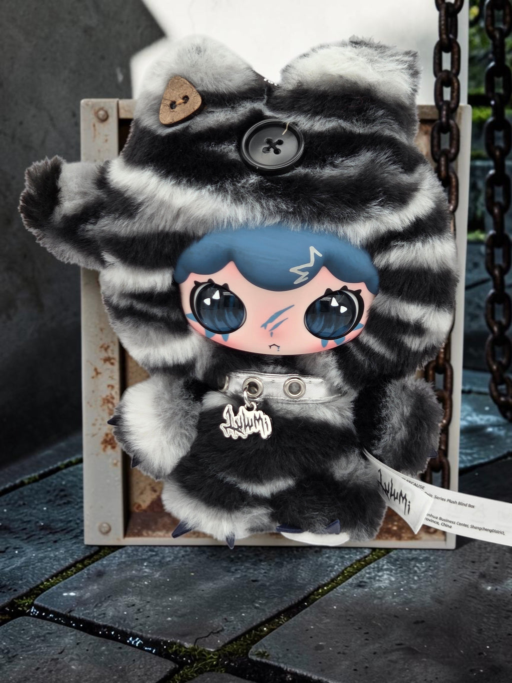 Momof2boyz Shop Lulumi plush toy with black and white faux fur, blue hair, and button eyes in a gothic style