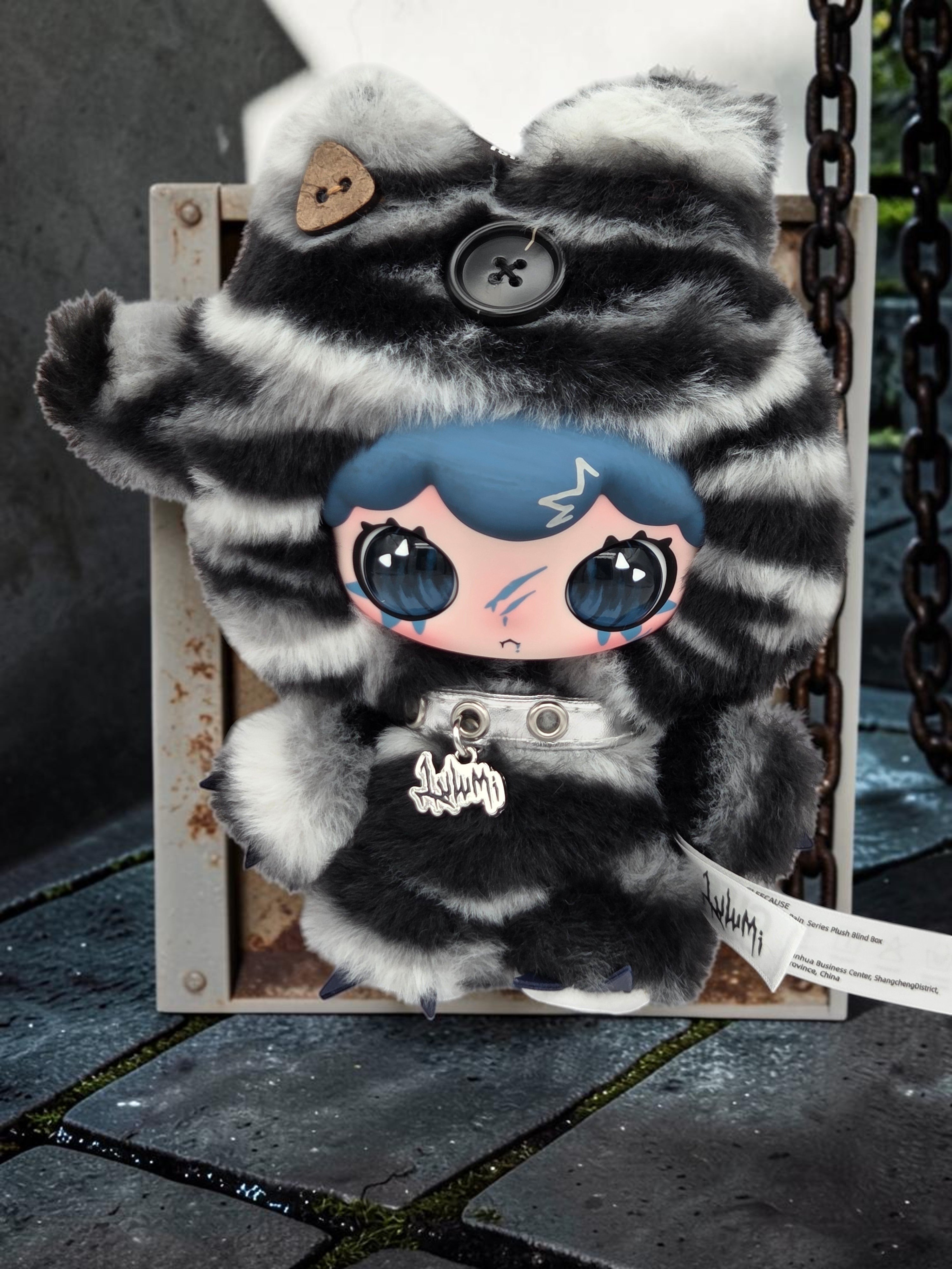 Momof2boyz Shop Lulumi plush toy with black and white faux fur, blue hair, and button eyes in a gothic style