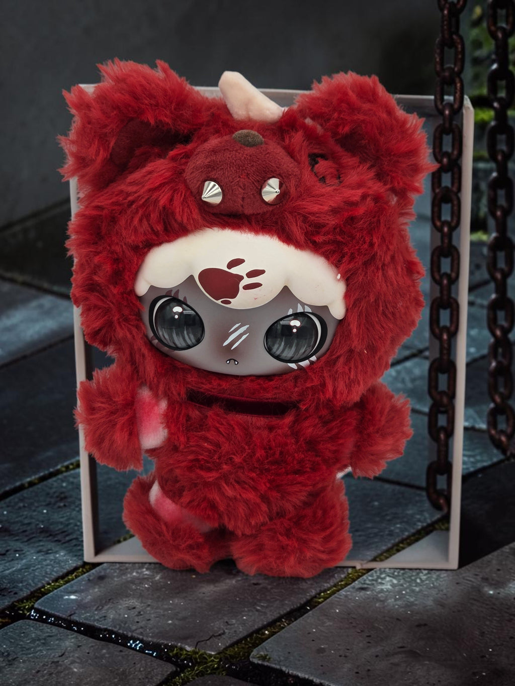 Momof2boyz Shop Lulumi The Seventh Pain collectible plush in deep red faux fur with metallic spikes and large eyes.