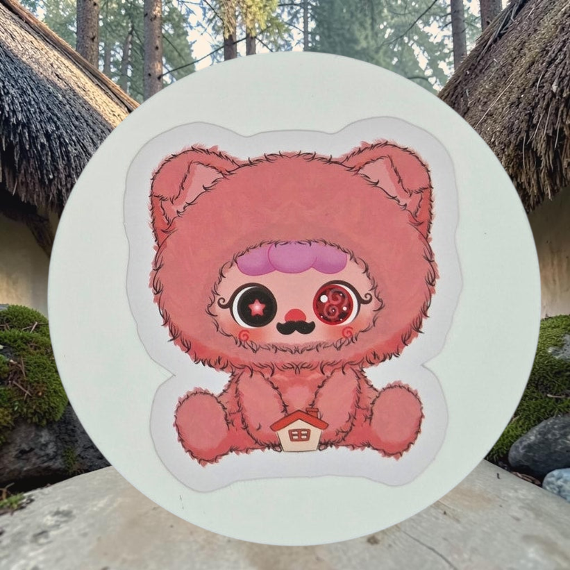 Momof2boyz Shop Migo Fairy Tales plush featuring a pink fuzzy bear character holding a small house icon