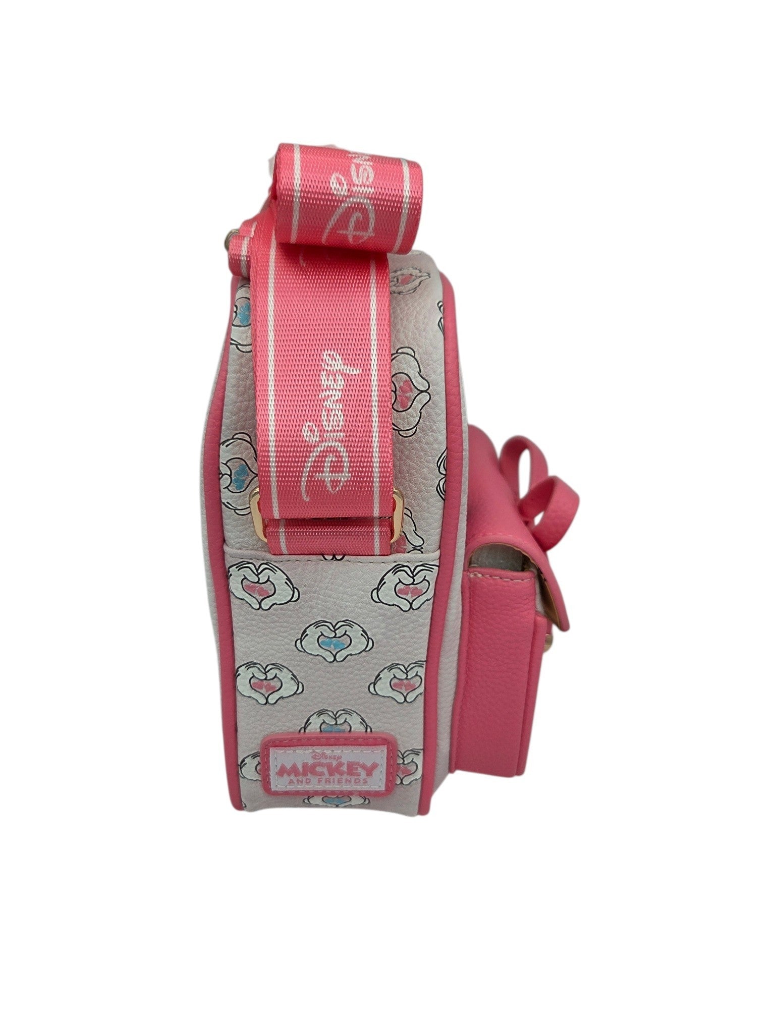 Side view of Momof2boyz Shop Disney Minnie Mouse crossbody bag in pink and white faux leather with branded strap.