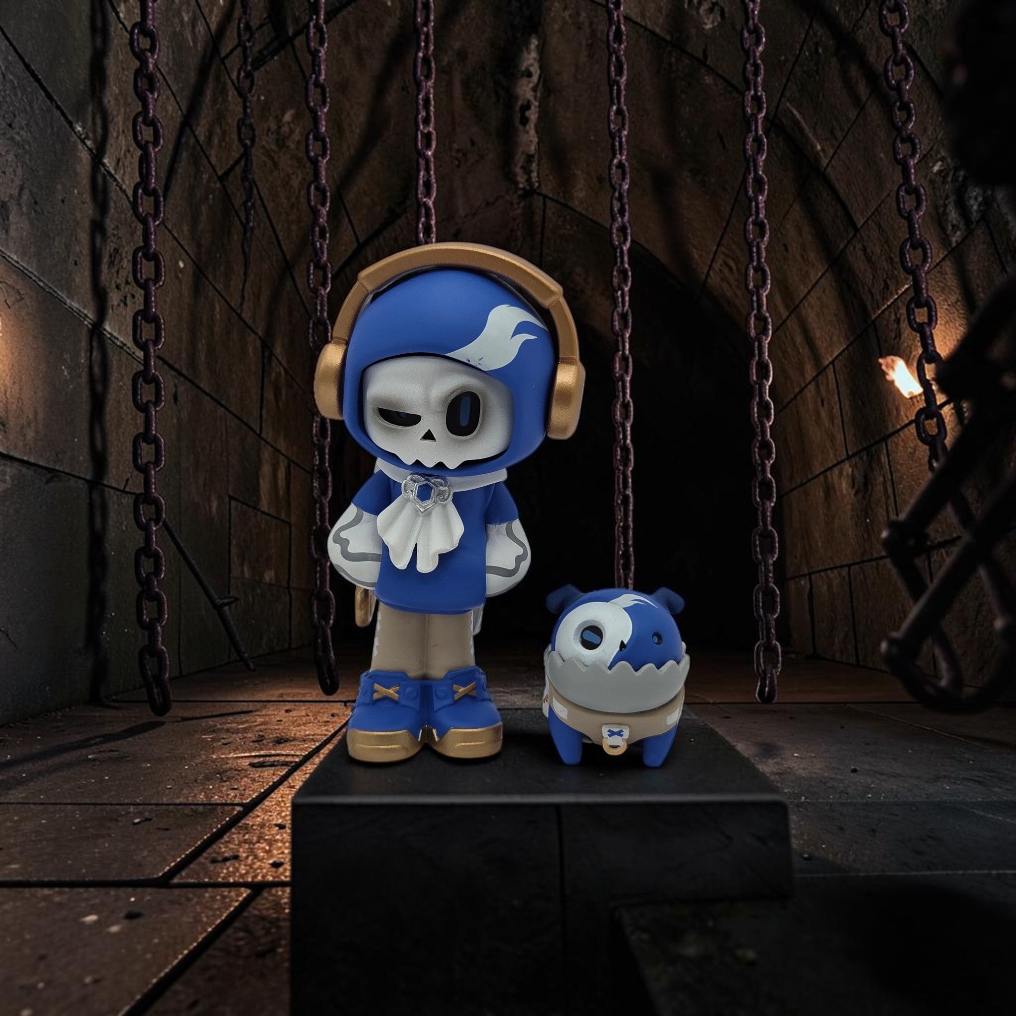 Momof2boyz Shop Mr. Bone collectible figure in blue and gold with matching pet in a dark dungeon setting