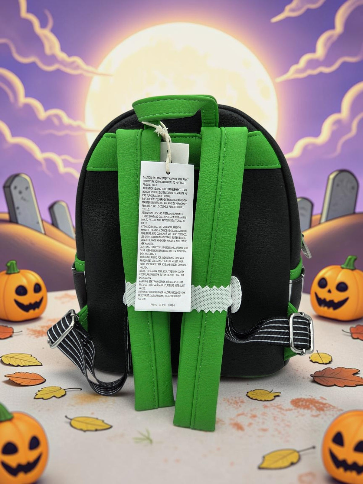 Momof2boyz Shop Disney Loungefly Nightmare Before Christmas mini backpack back view with green straps and black base