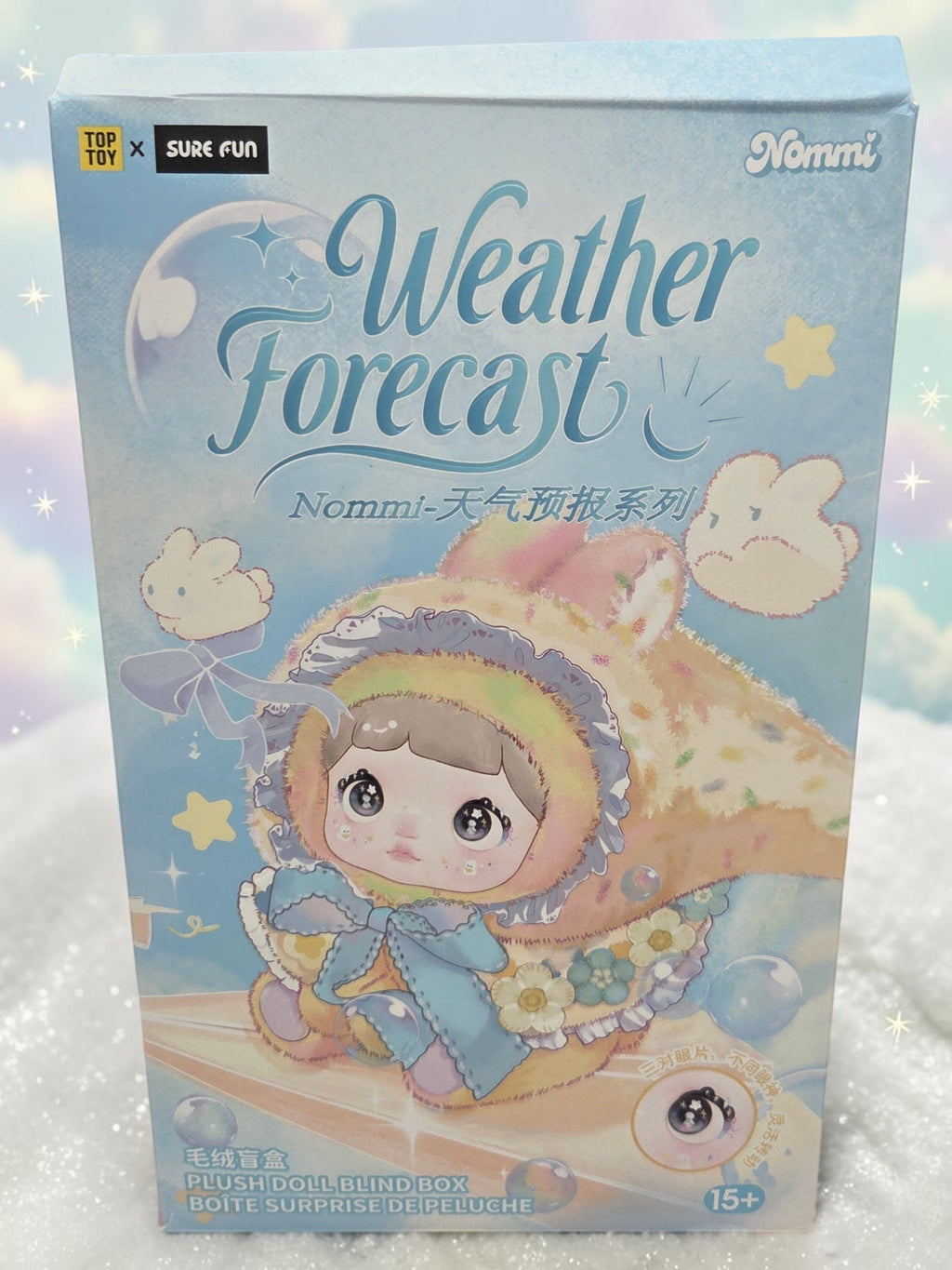 Momof2boyz Shop Nommi Weather Forecast plush doll blind box featuring a cute character in a pastel blue package