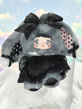Momof2boyz Shop Nommi Weather Forecast plush doll in grey faux fur with a black lace dress and matching hair bow.