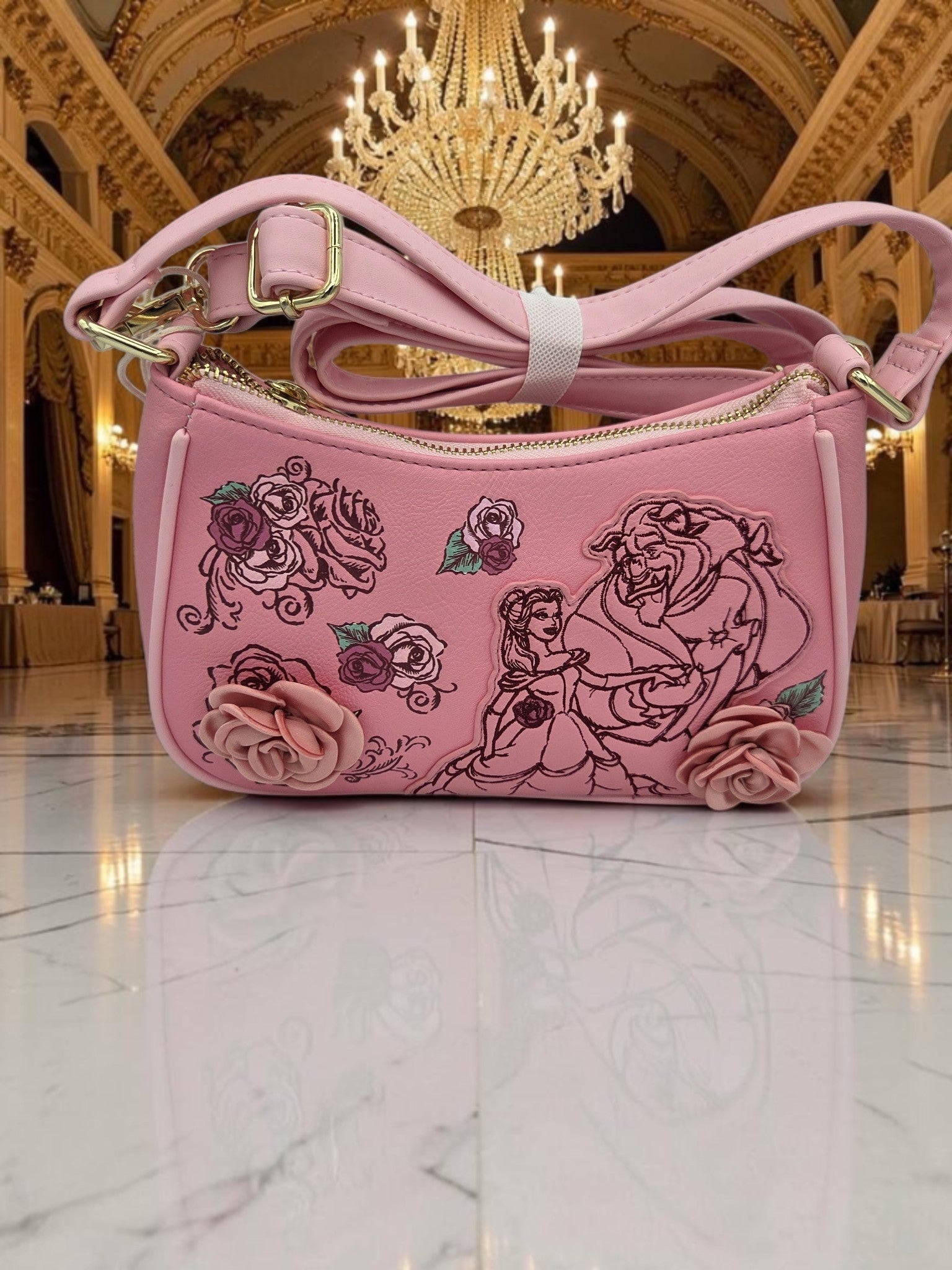Momof2boyz Shop pink vegan leather Loungefly Beauty and the Beast crossbody bag with 3D floral appliqués.