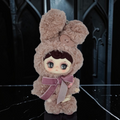 Momof2boyz Shop Silent Haven Tarti plush rabbit figure with soft pink faux fur, large expressive eyes, and velvet bow.