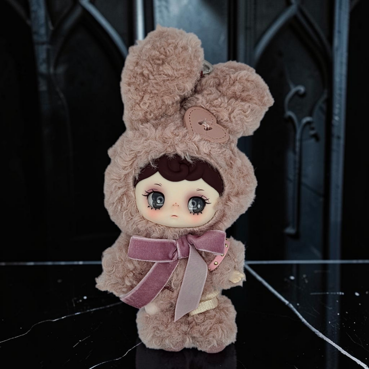 Momof2boyz Shop Silent Haven Tarti plush rabbit figure with soft pink faux fur, large expressive eyes, and velvet bow.