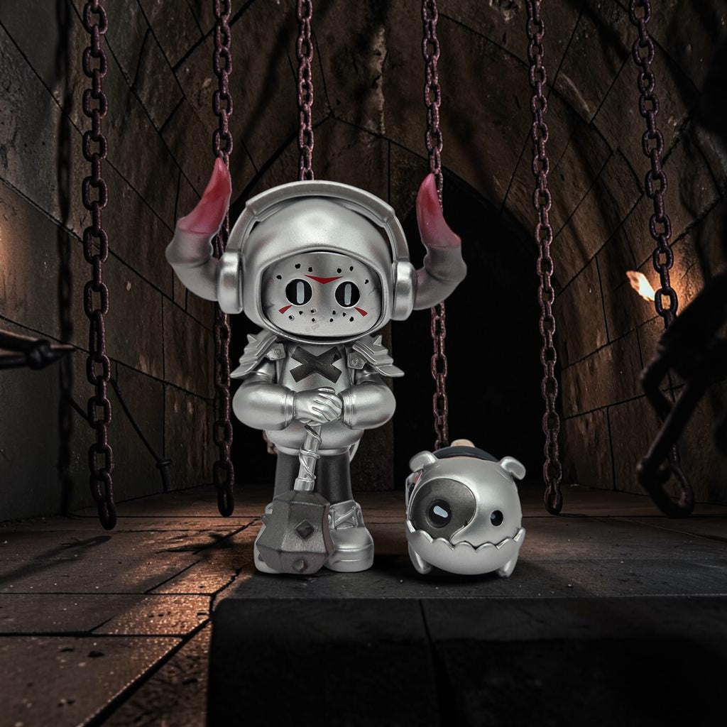 Momof2boyz Shop Wicked Union Mr. Bone silver knight figure with horned helmet, hammer, and matching companion pet.