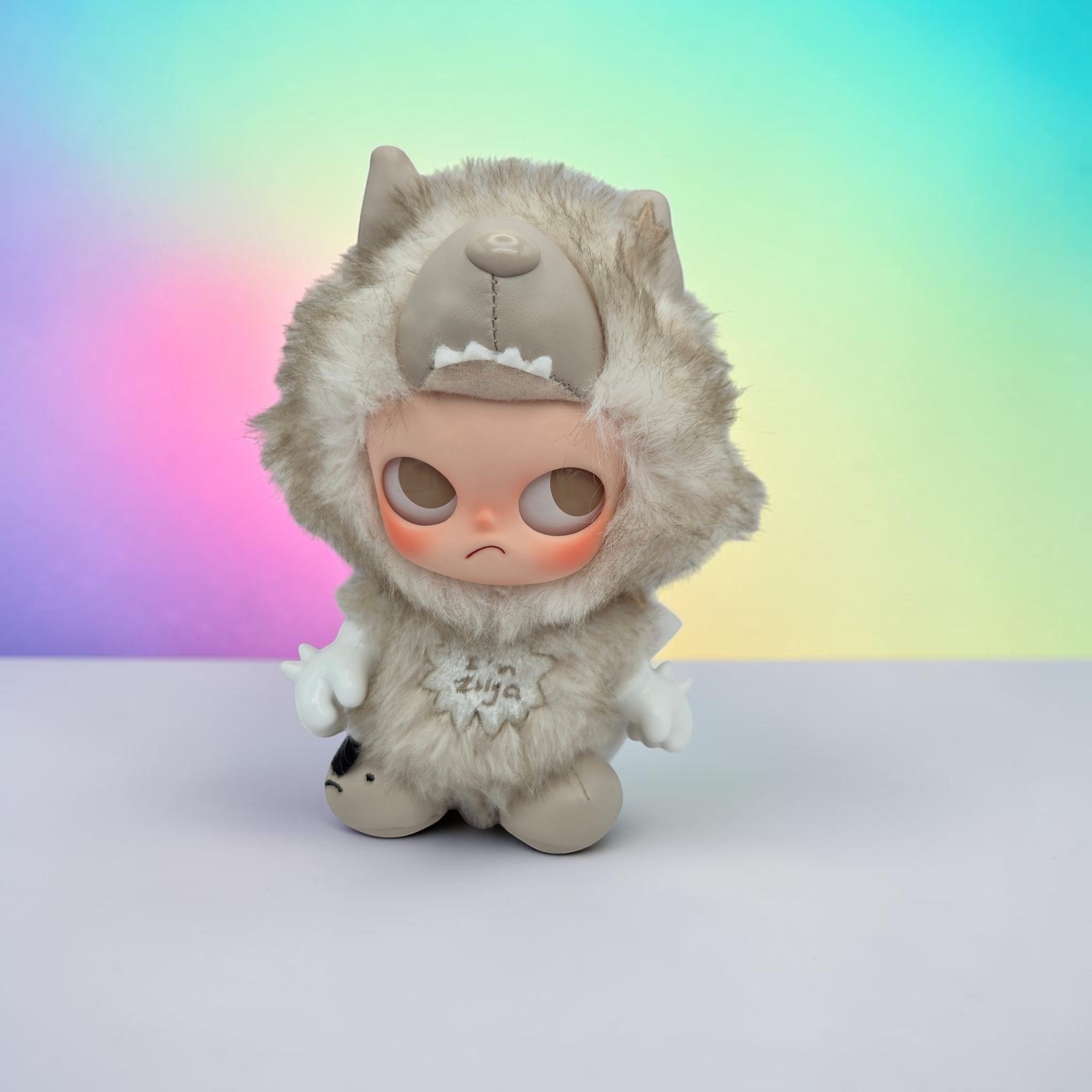 Momof2boyz Shop POP MART Zsiga collectible art toy figure wearing a fluffy wolf hood on a vibrant gradient background