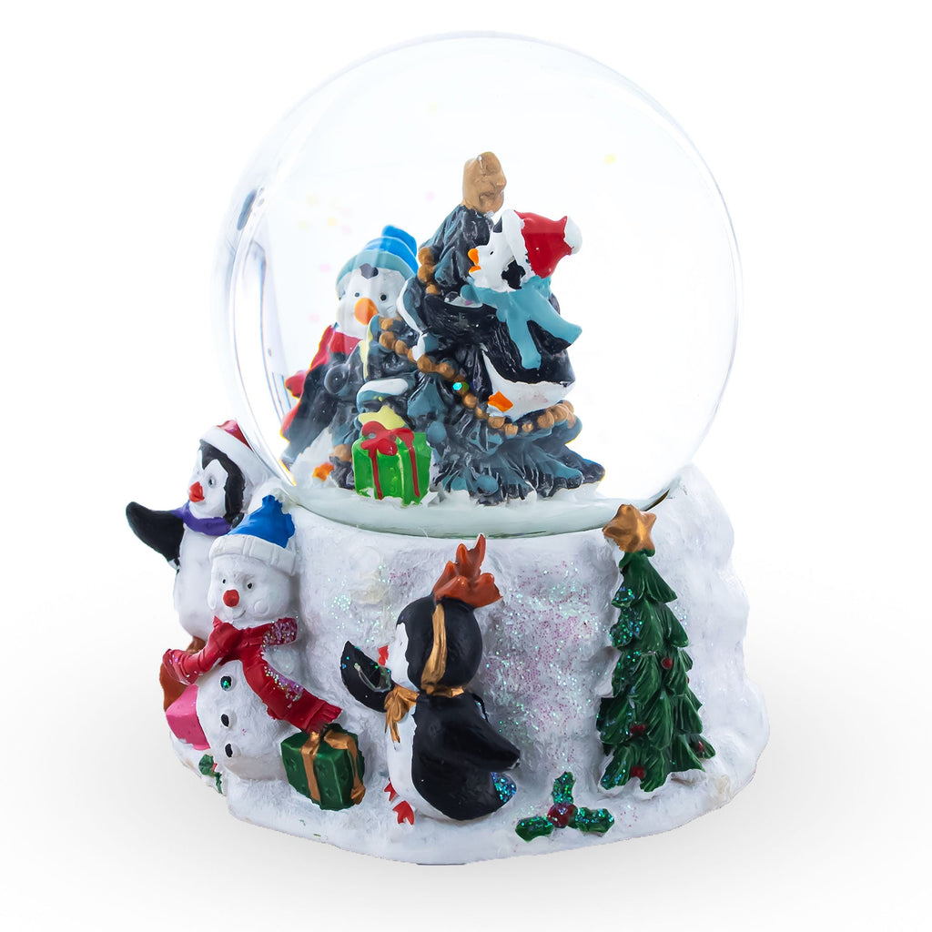 Penguins' Festive Tree Celebration Snow Water Globe
