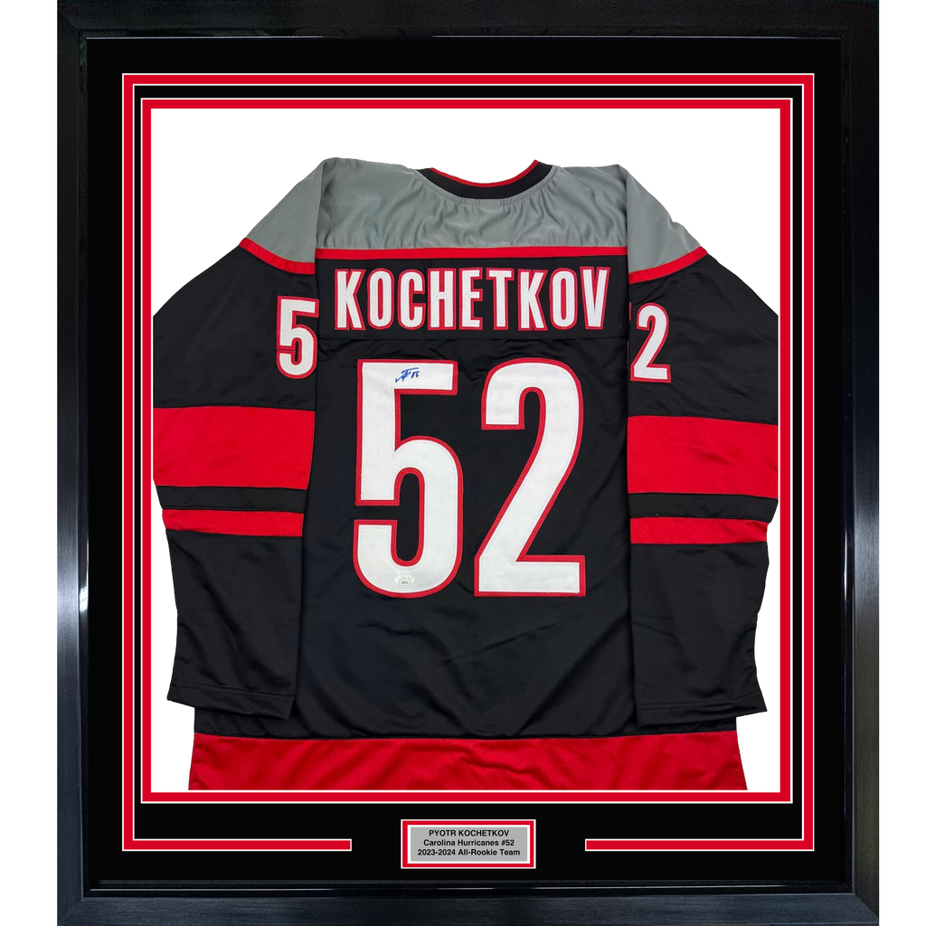 Framed Autographed/Signed Pyotr Kochetkov 35x39 Carolina Black Hockey Jersey JSA COA