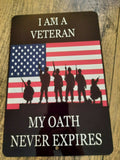 I Am a Veteran My Oath Never Expires 8x12 Inch Metal Military Wall Sign for Armed Forces